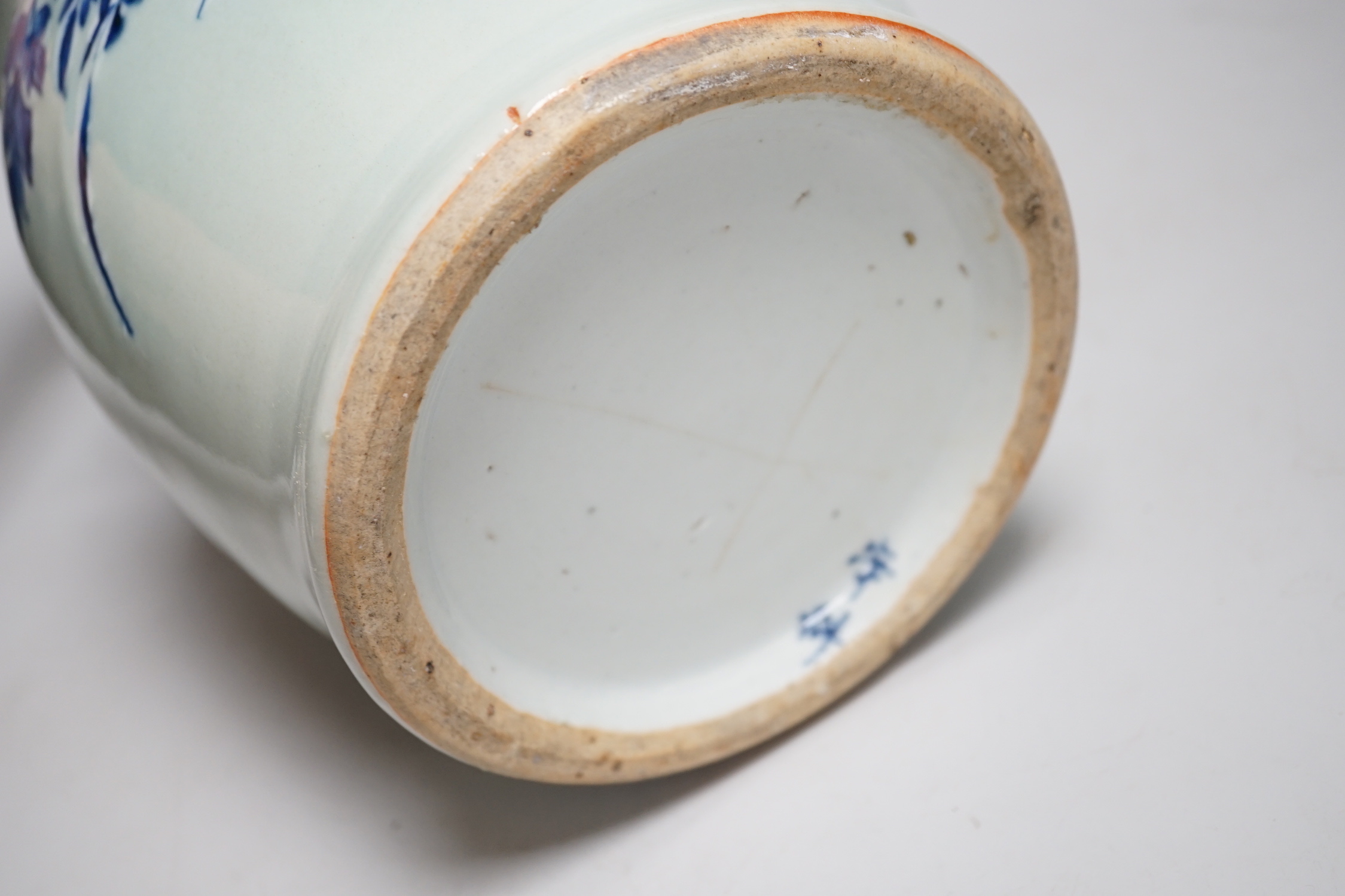 A Chinese celadon ground underglaze blue baluster vase, early 20th century, 34cm